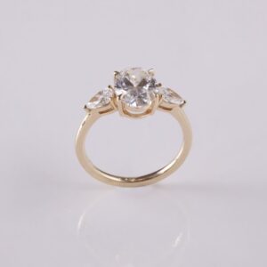 Oval Diamond Three-Stone Engagement Ring with Pear Side Stones